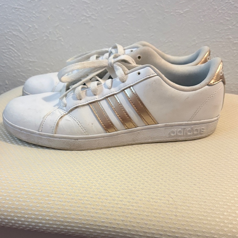 Adidas White Sneakers with Gold Stripes